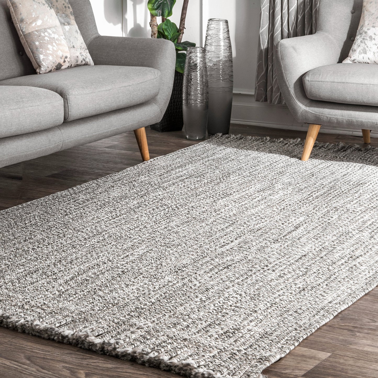 BRAIDED COURT TASSEL BLACK | RUGS