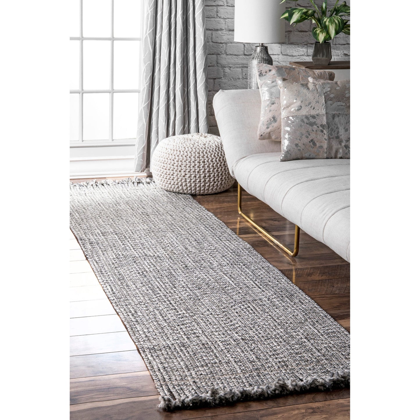 BRAIDED COURT TASSEL BLACK | RUGS