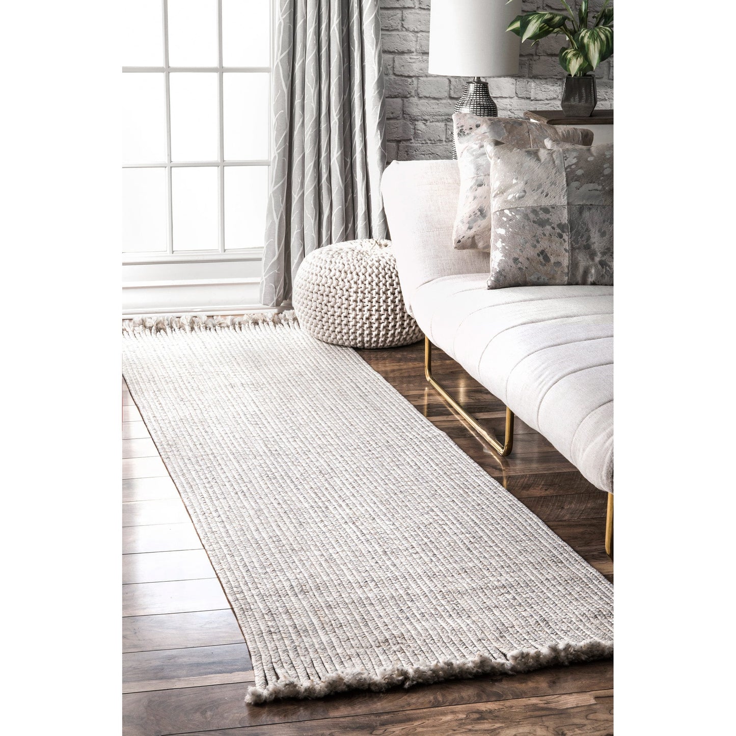BRAIDED COURT TASSEL BLACK | RUGS