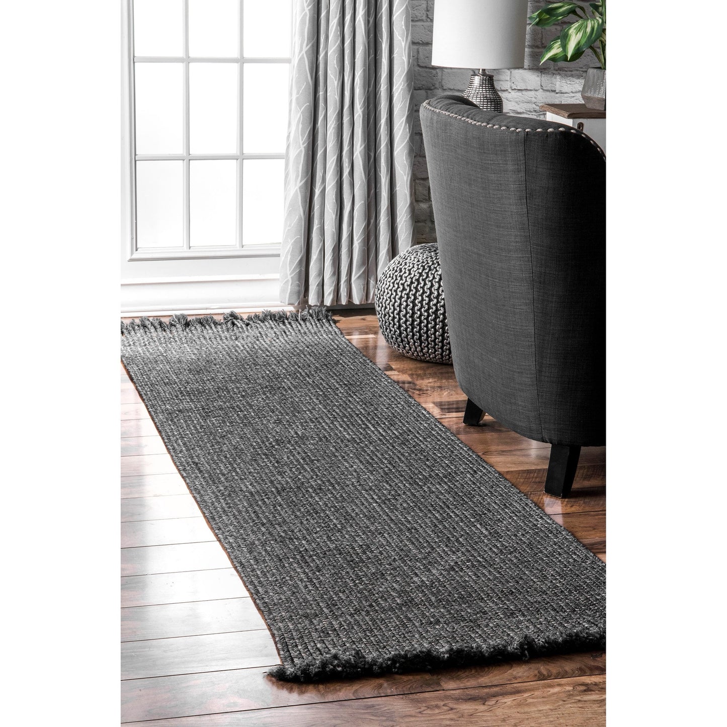 BRAIDED COURT TASSEL BLACK | RUGS